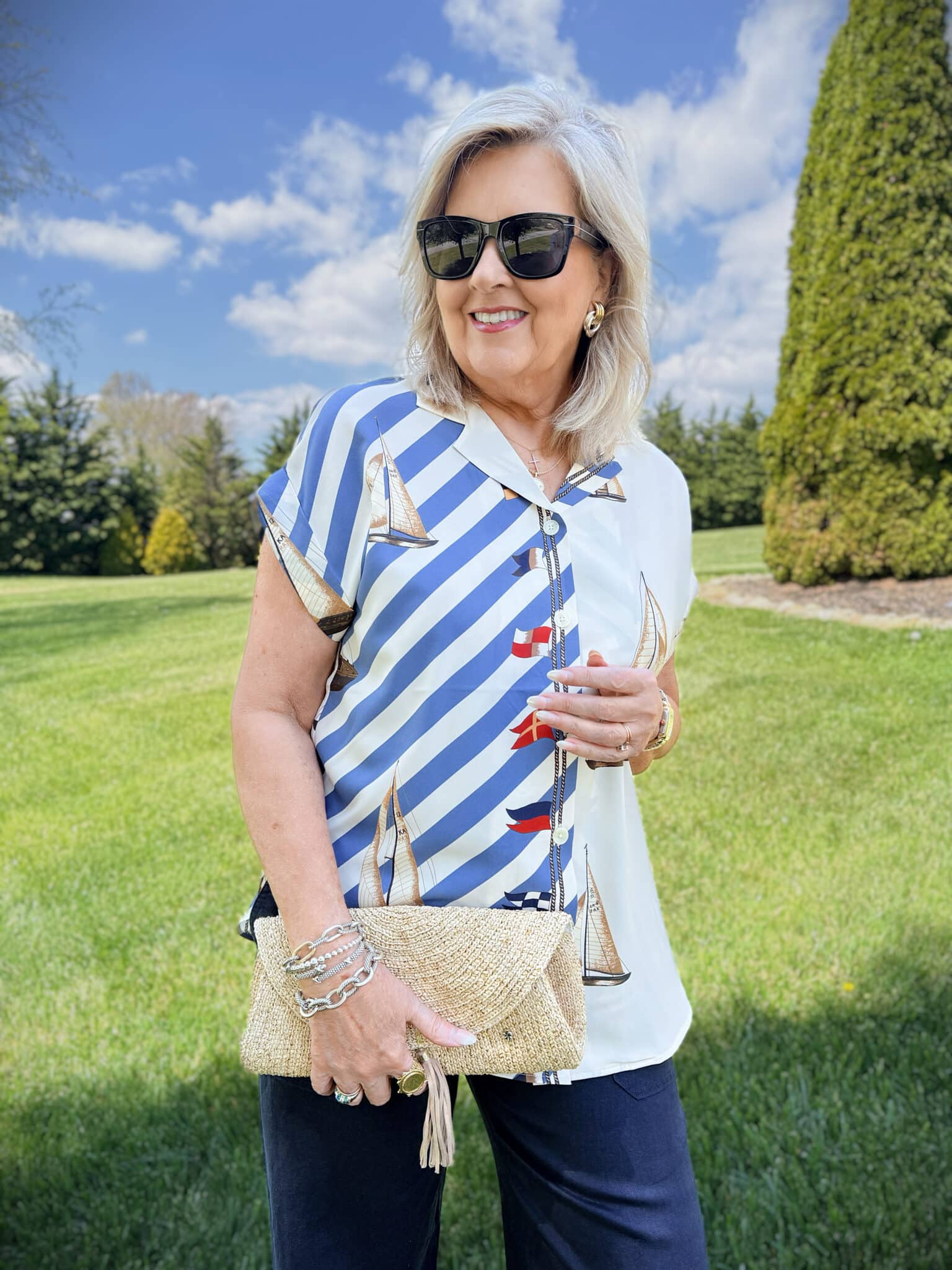 Tania wearing a nautical button up shirt from Macy's