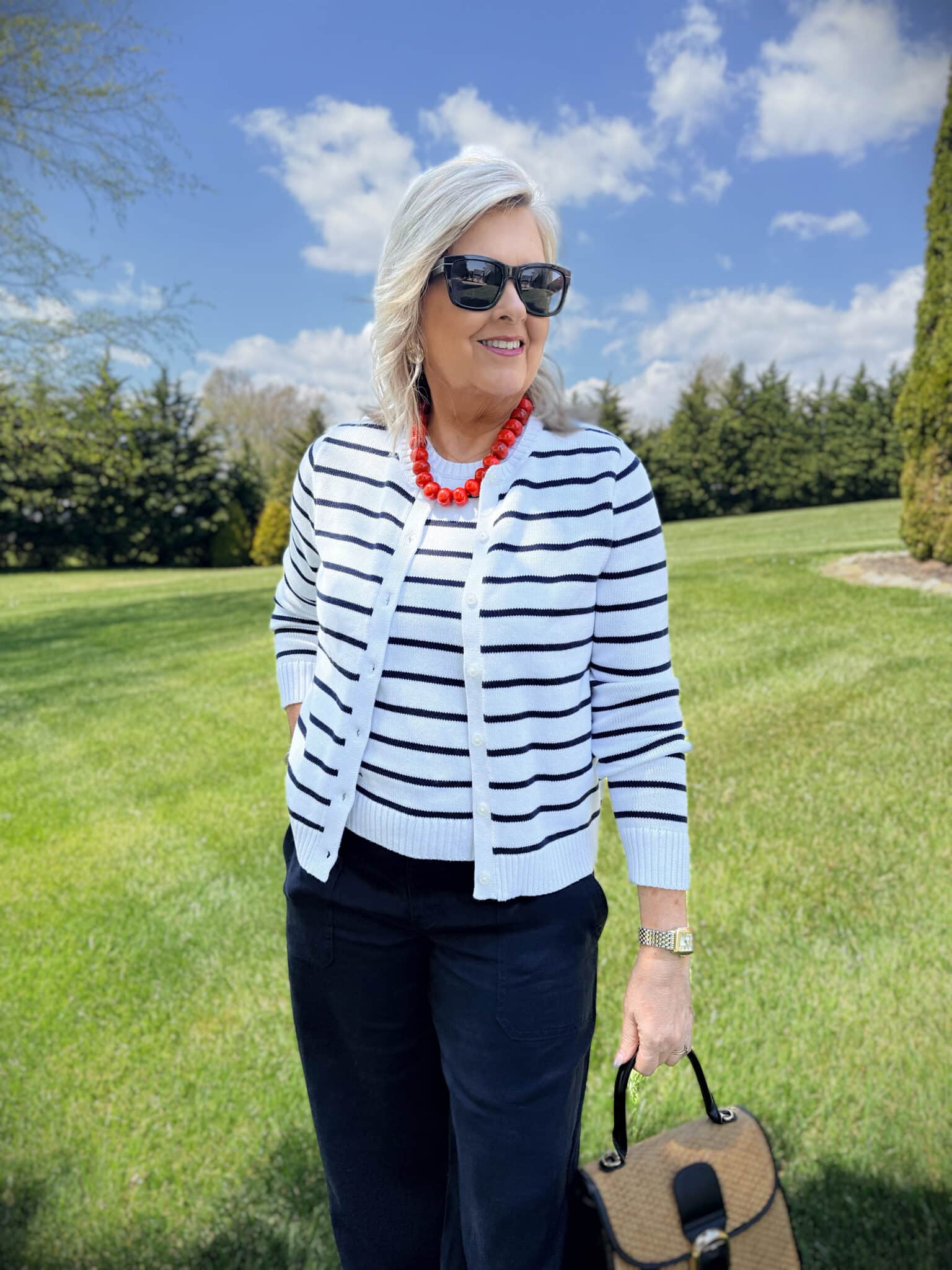 Tania wearing a striped navy & white sweater from Macy's