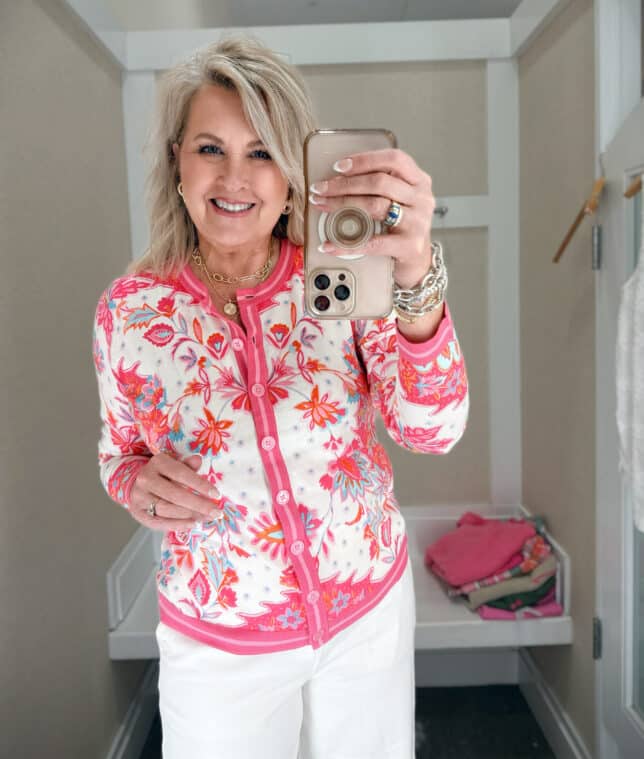 Tania wearing a pink and white printed cardigan from Talbots