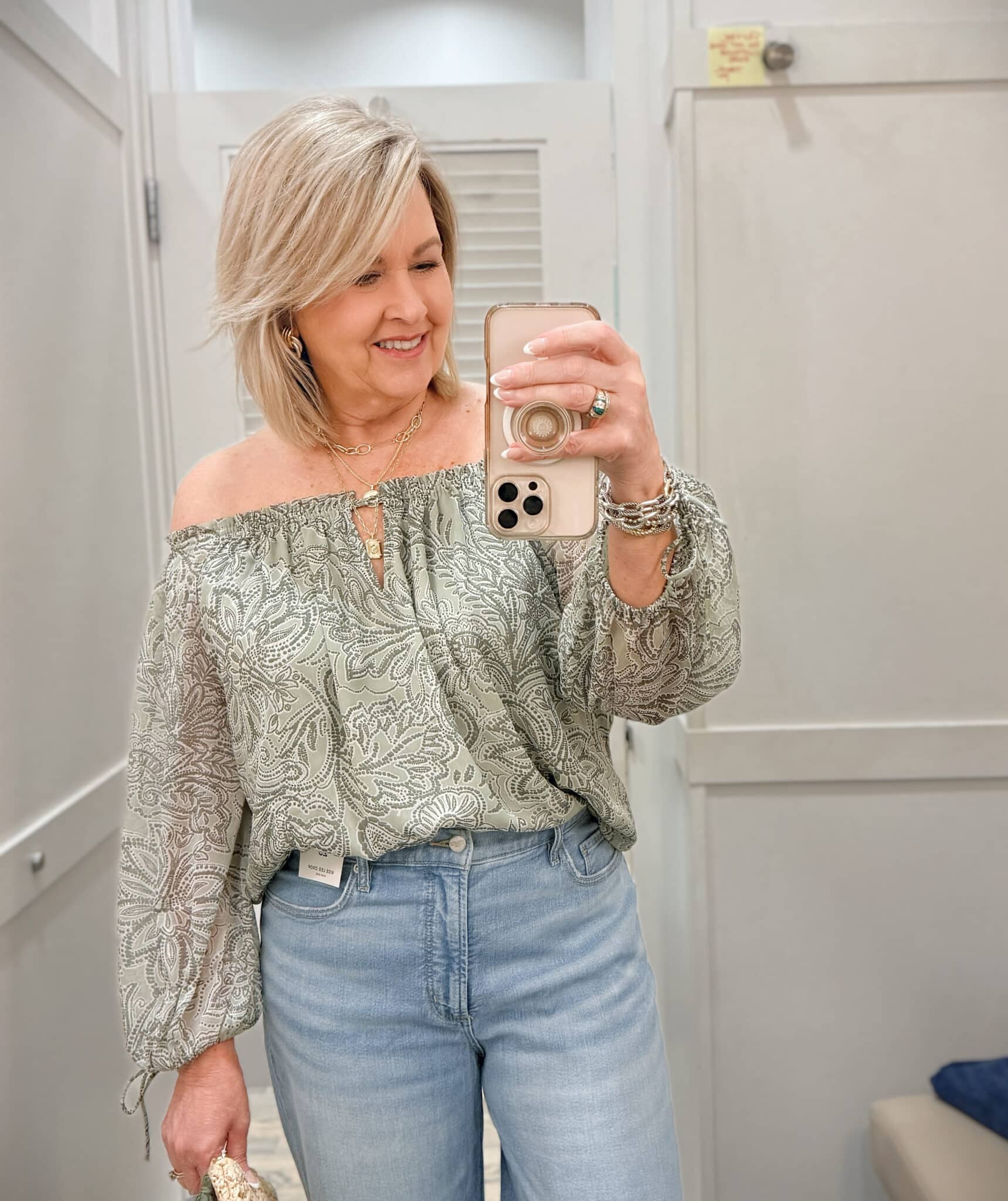 Tania wearing an off the shoulder top from Loft