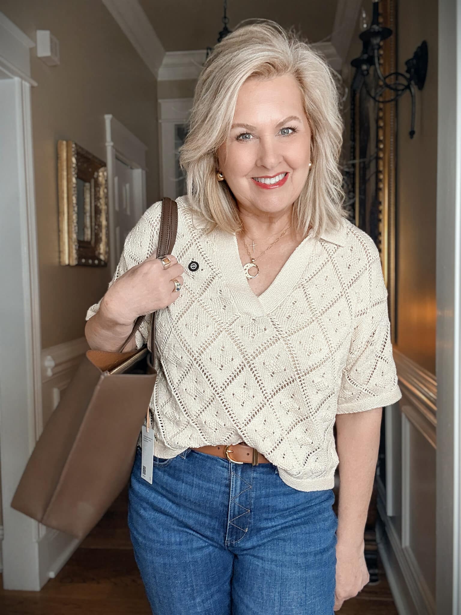 Tania wearing a Pointelle knit sweater from Nordstrom