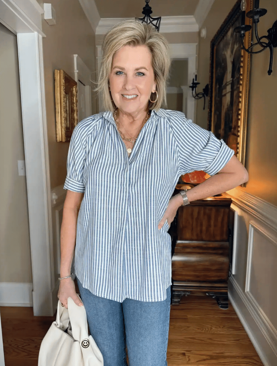 Tania Wearing a striped V-neck shirt with jeans