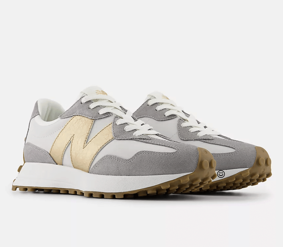 new balance tennis shoes with gold n on them