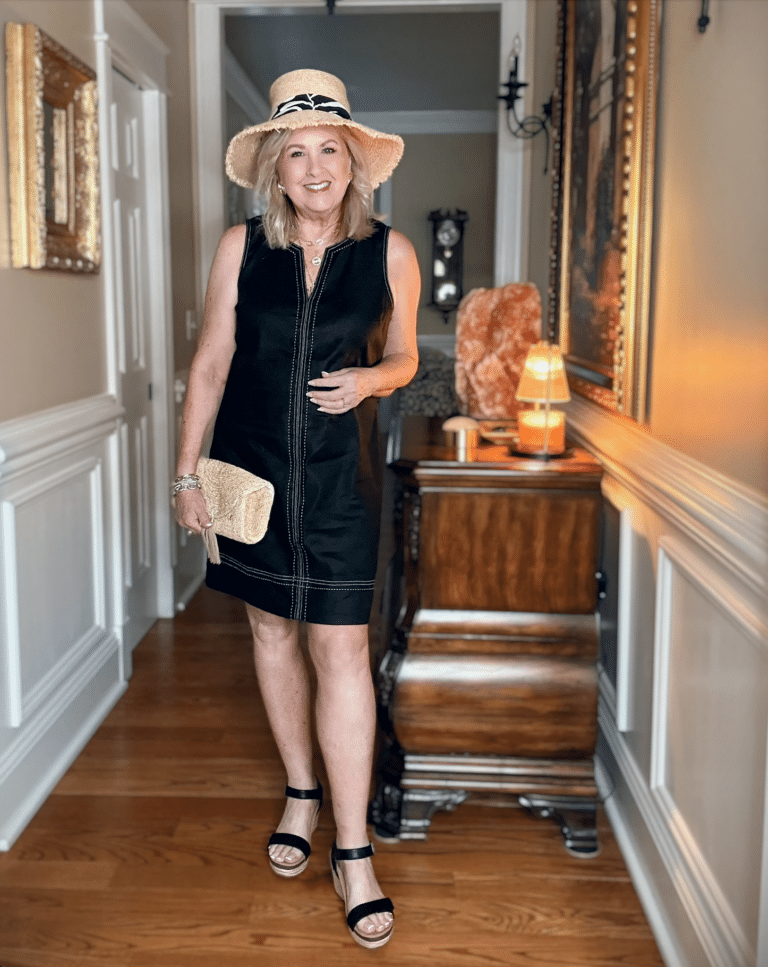 Tania Stephens wearing a Black dress with white stitching from Tommy Bahama