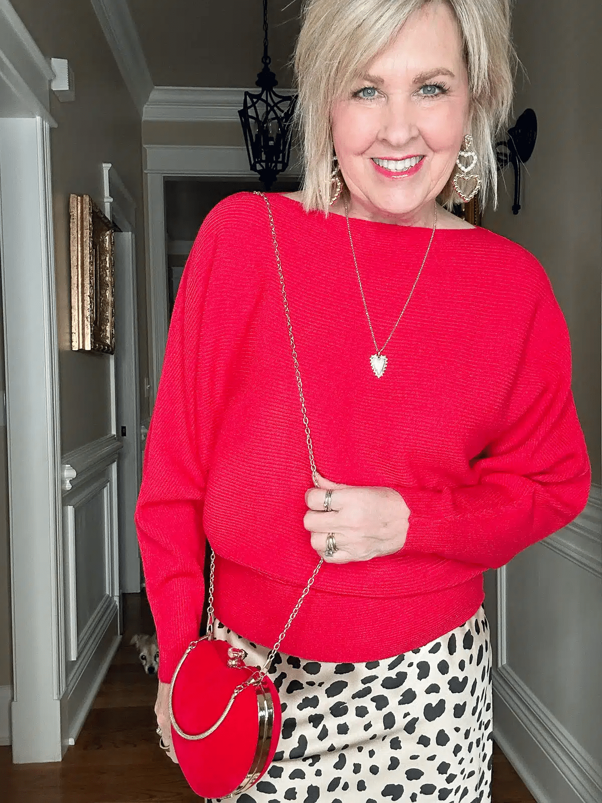 TANIA WEARING A NECKLACE WITH A BOAT NECK