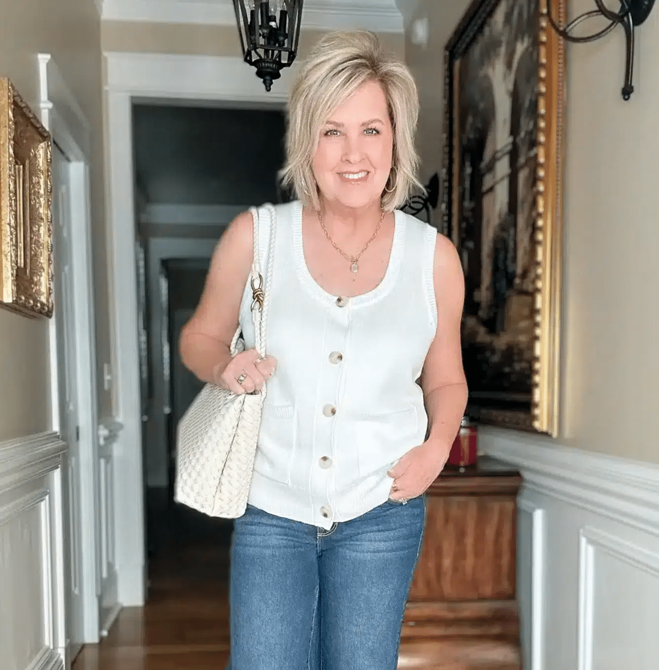 TANIA WEARING A NECKLACE WITH A SCOOP NECK