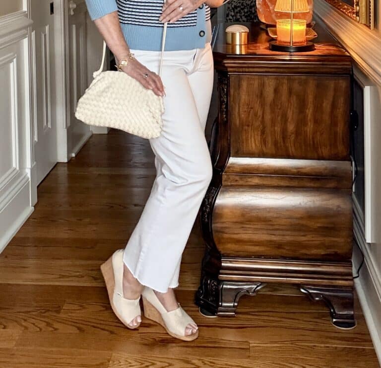 Tania wearing white jeans and TOMS espadrilles.