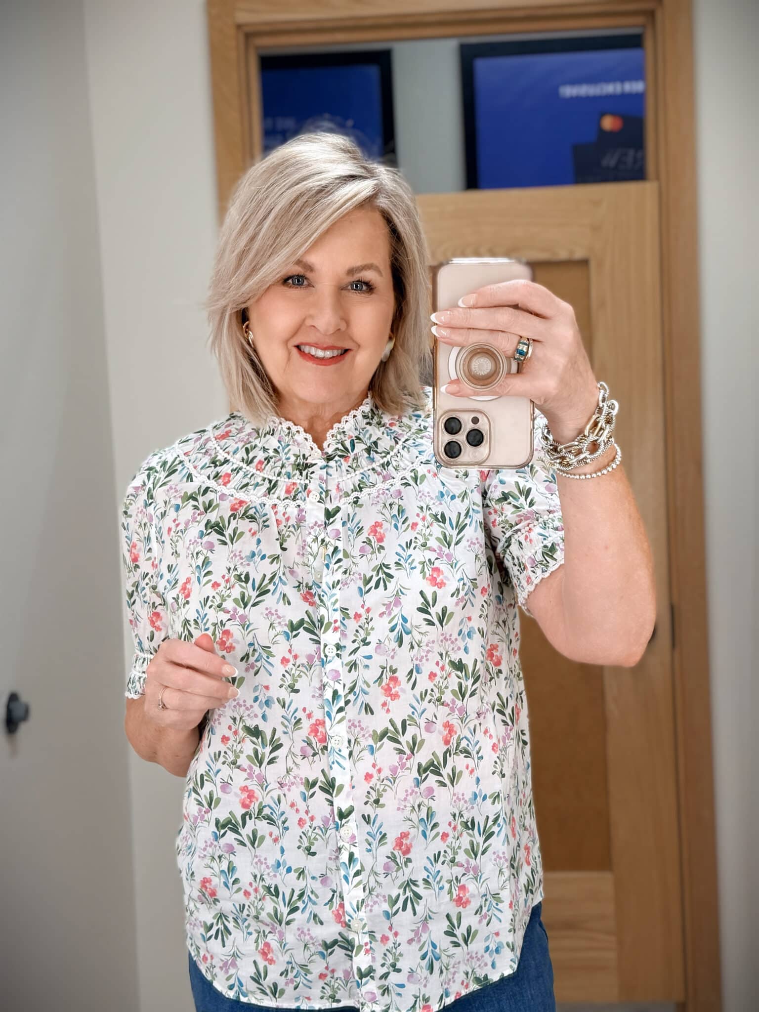 Tania wearing a floral puff sleeve top from J.Crew Factory