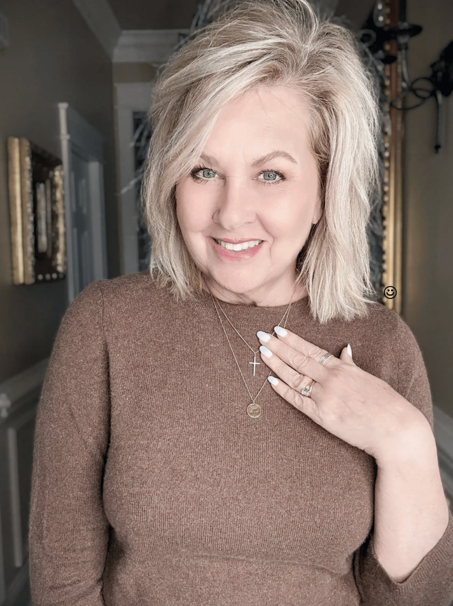 TANIA WEARING A DELICATE NECKLACE
