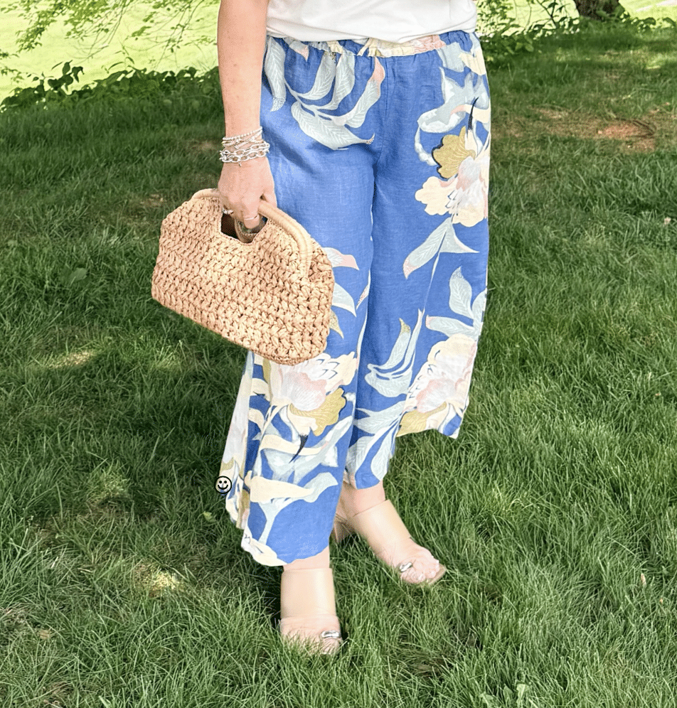 Tania wearing cropped floral linen pants from Anthrpologie