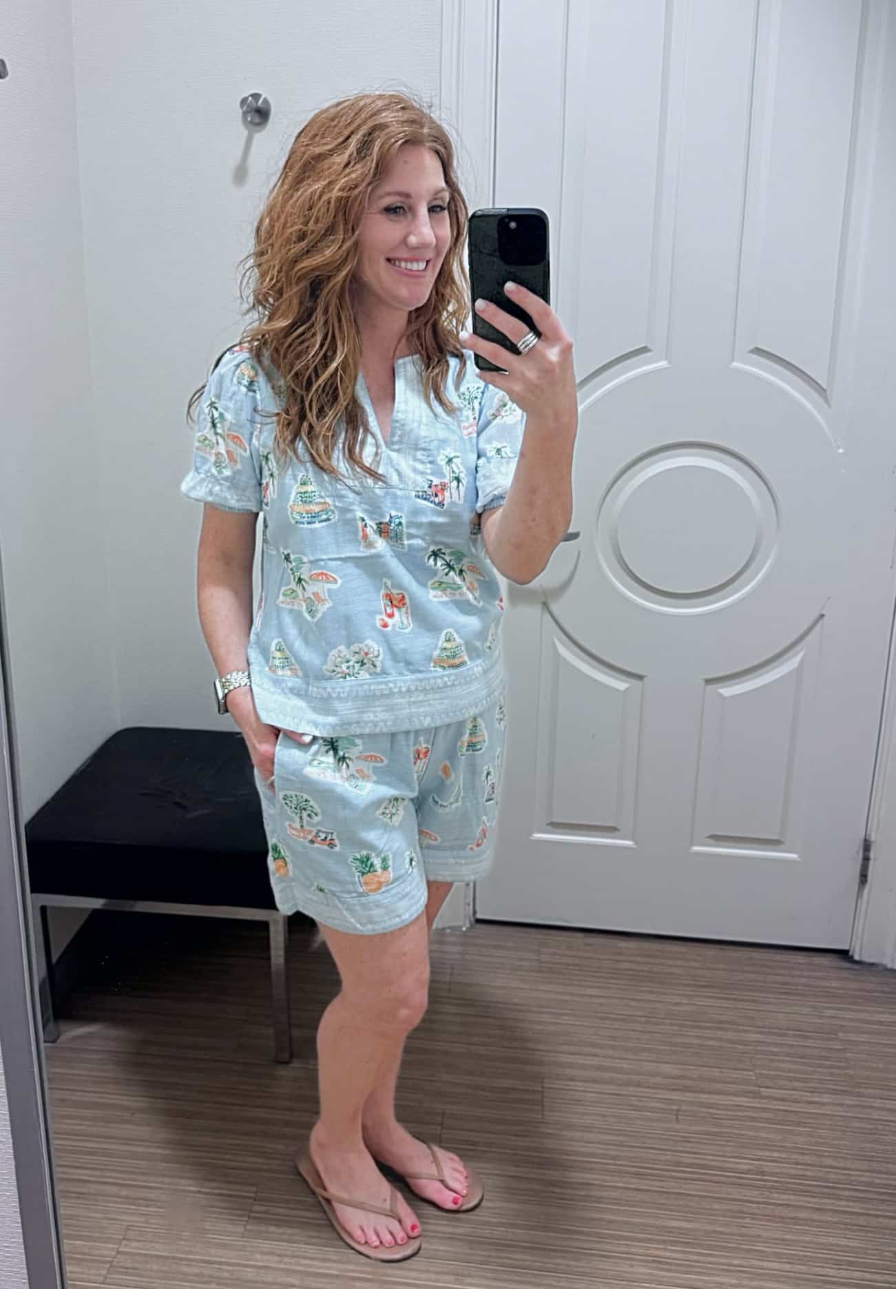 Stephanie wearing a blue Down South x Crown & Ivy printed blouse with matching pull-on shorts from Belk.