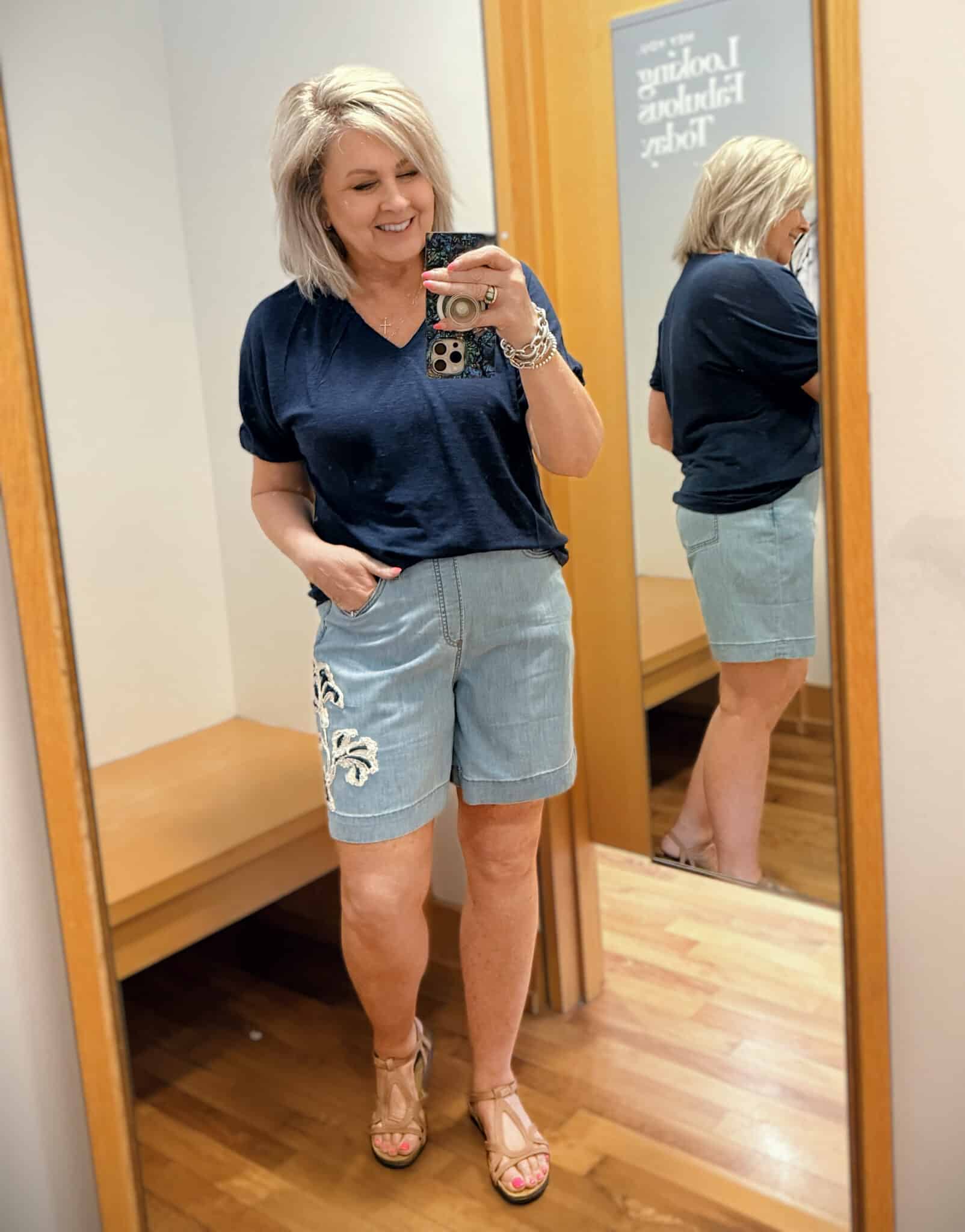 Tania wearing a blue top with embroidered shorts from Chicos