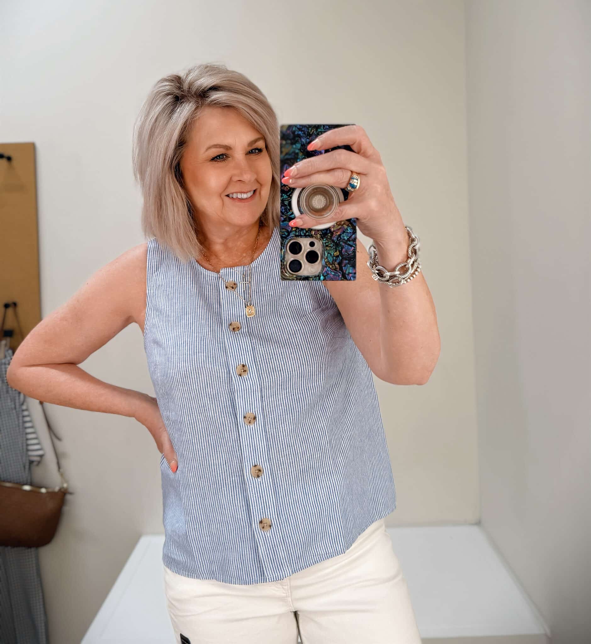 Tania wearing a blue button vest from J.Crew Factory