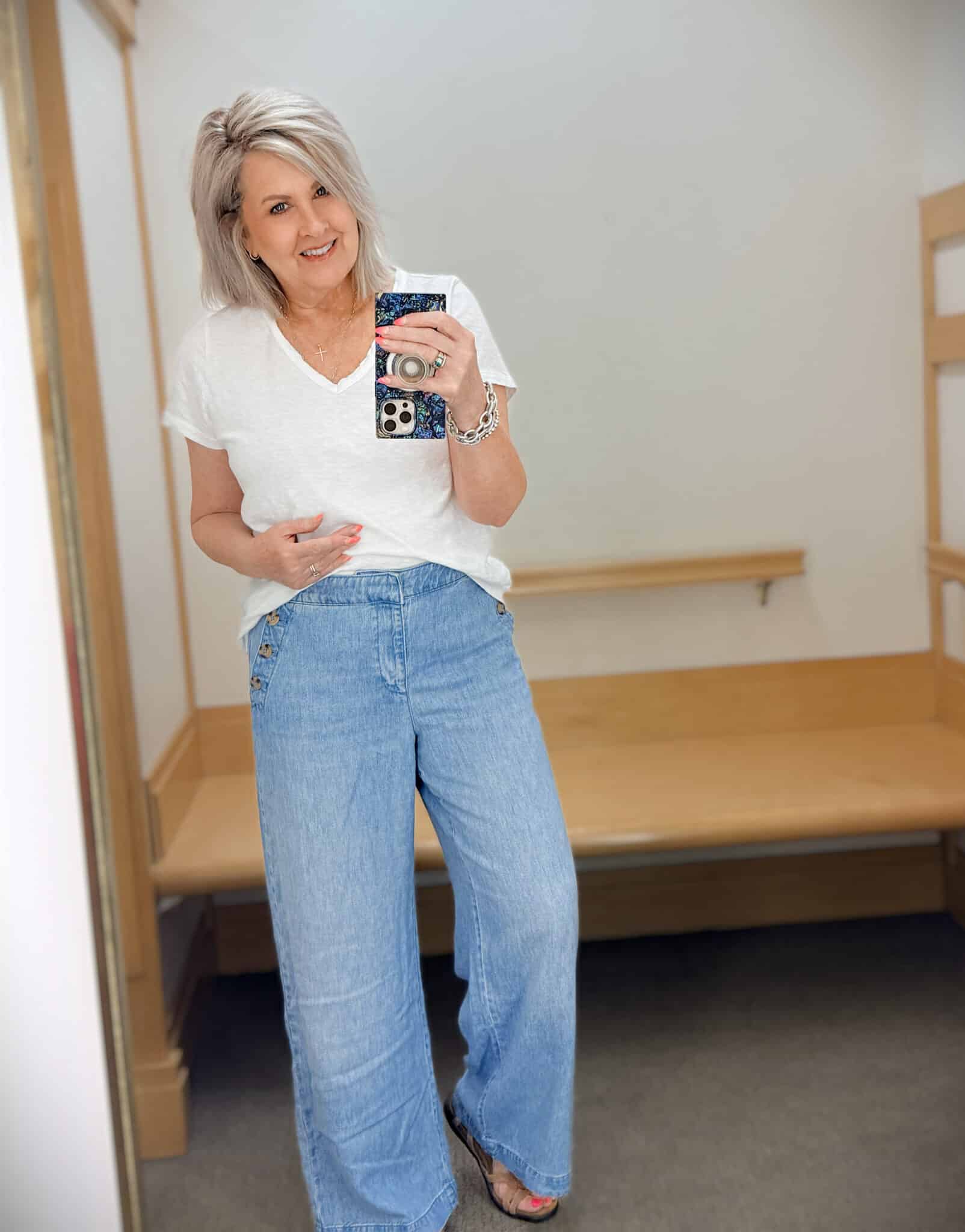 Tania wearing a white v-neck tee with lightweight sailor