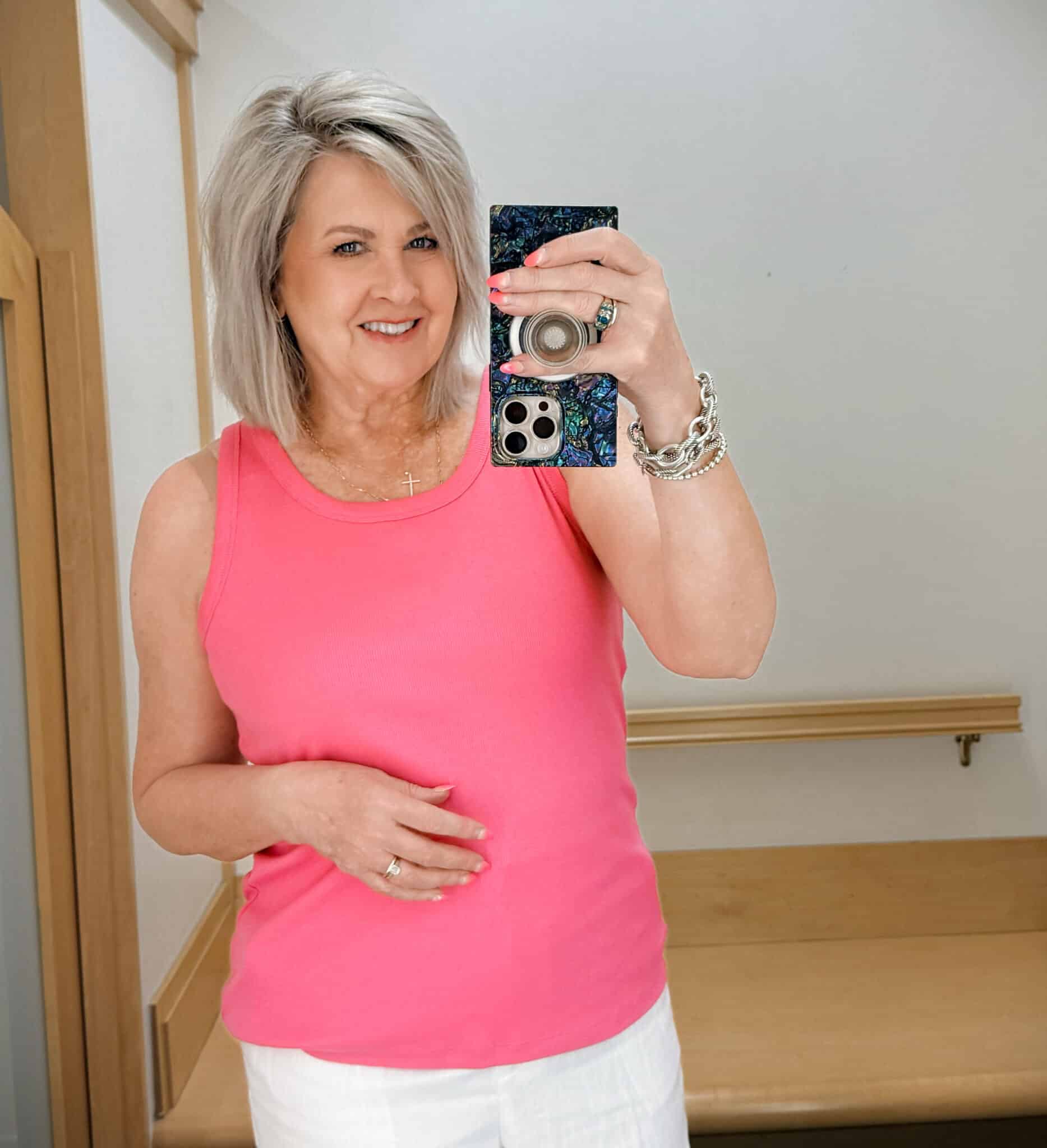 Tania wearing a pink tank from Talbots