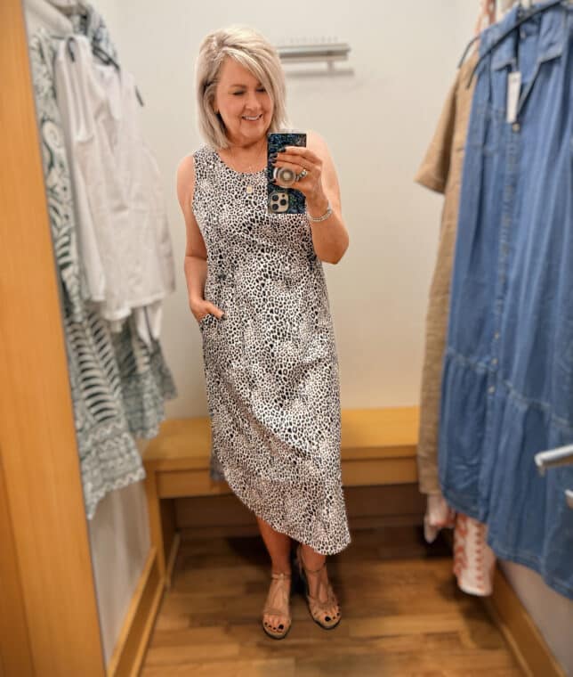 Tania wearing an animal print parachute dress from Chico's