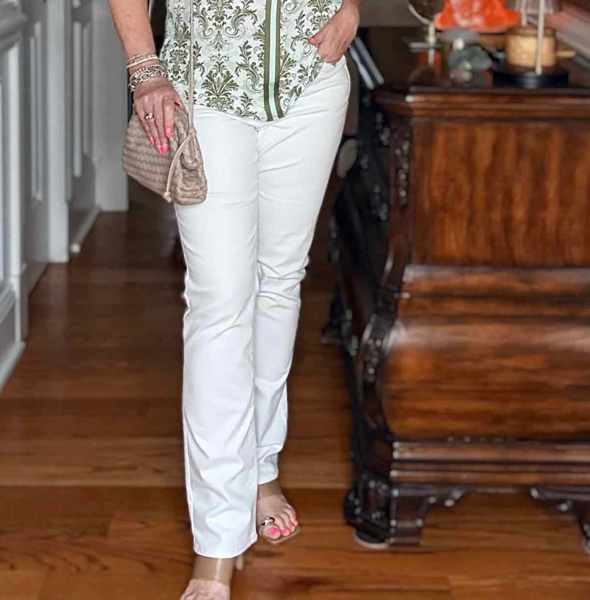 Tania wearing white straight leg jeans