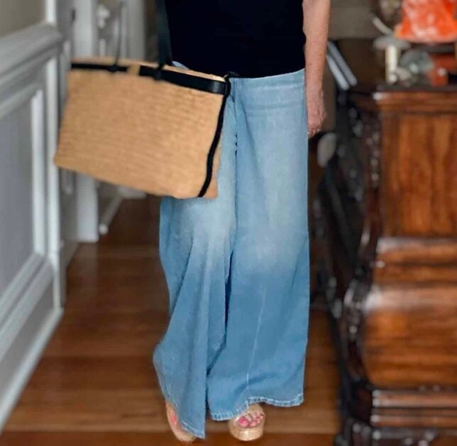 Tania wearing flowy wide leg jeans from SPANX