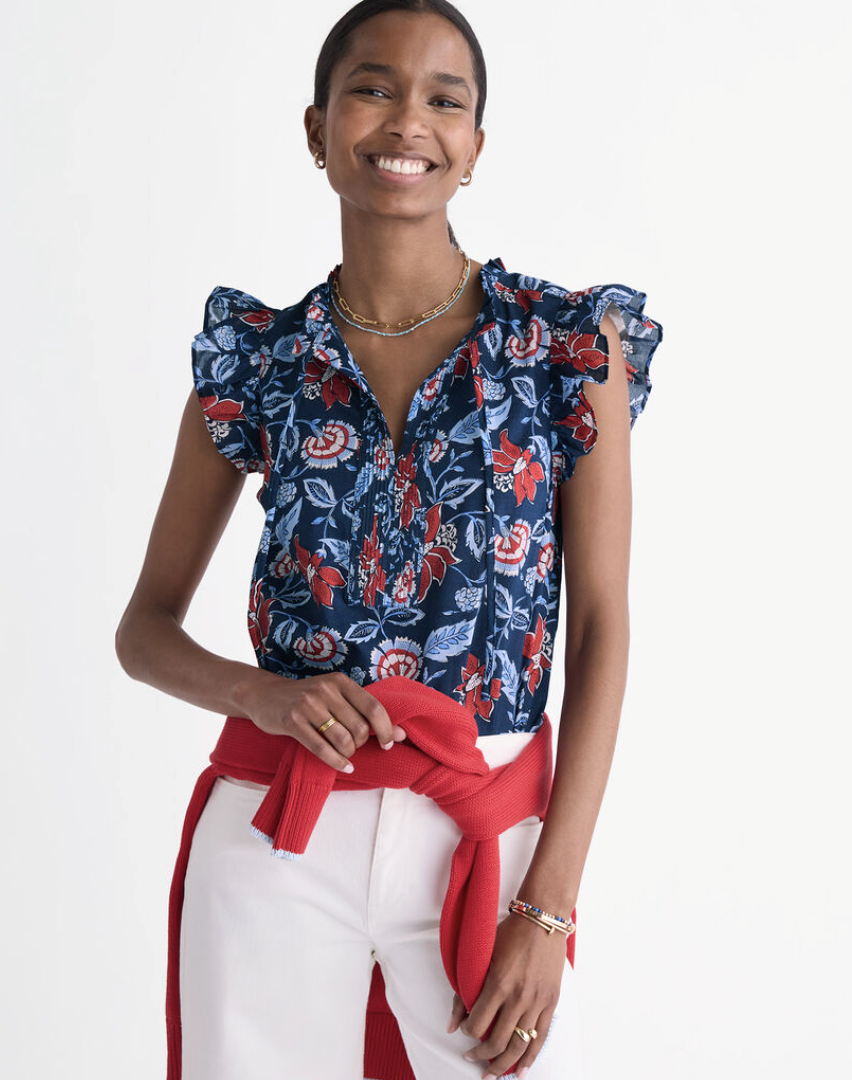 red, white, and blue floral top with flutter sleeves