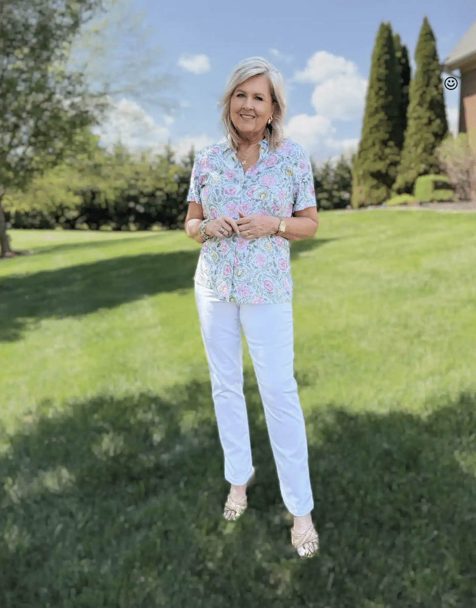 Tania wearing white denim pants