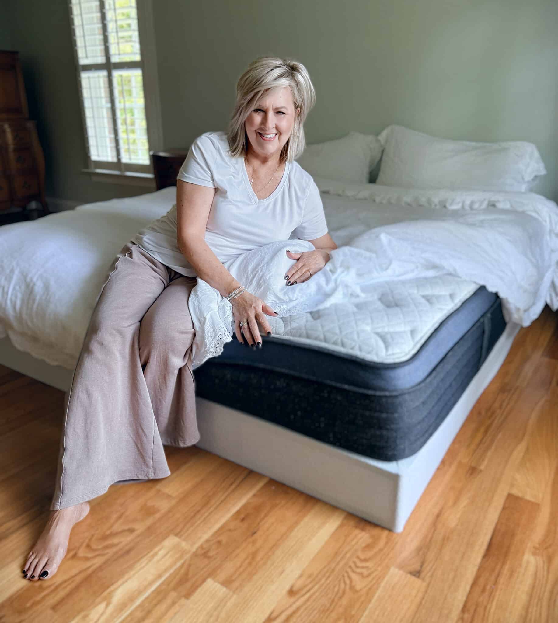 Tania relaxing on a Helix Midnight Luxe mattress