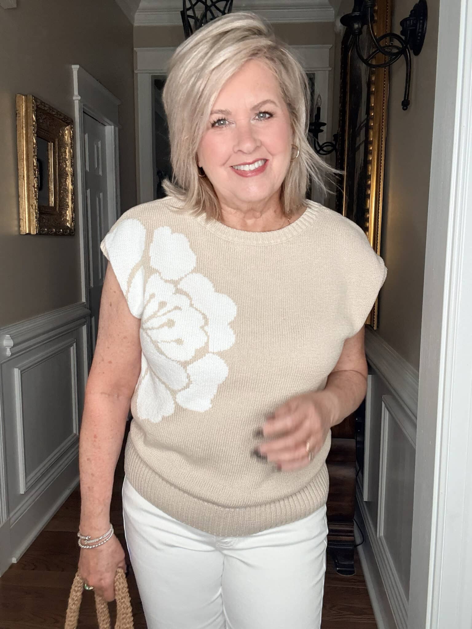 Tania wearing a neutral floral sweater from J.Jill