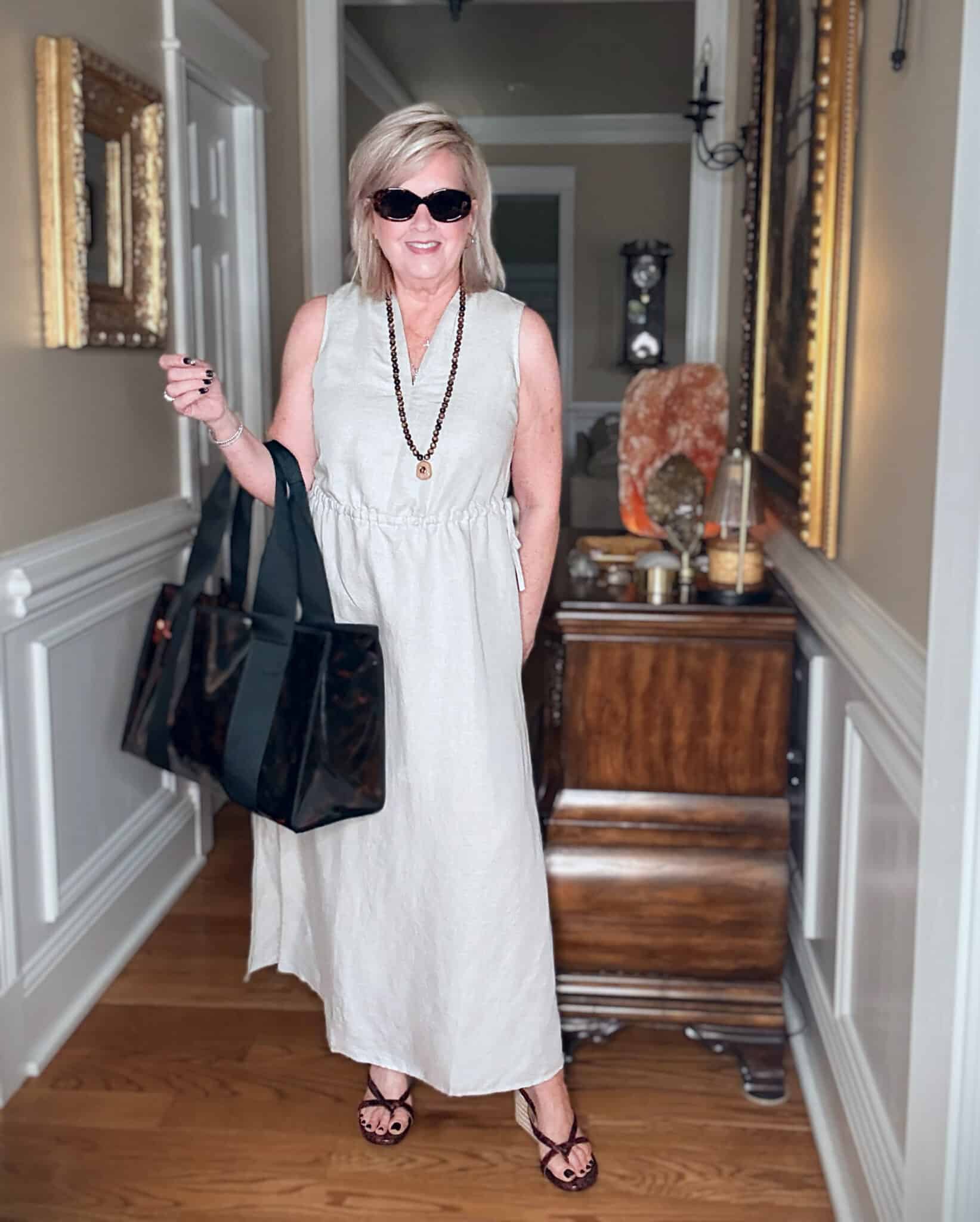 Tania wearing a neutral maxi dress from J.Jill with tortoise print accessories
