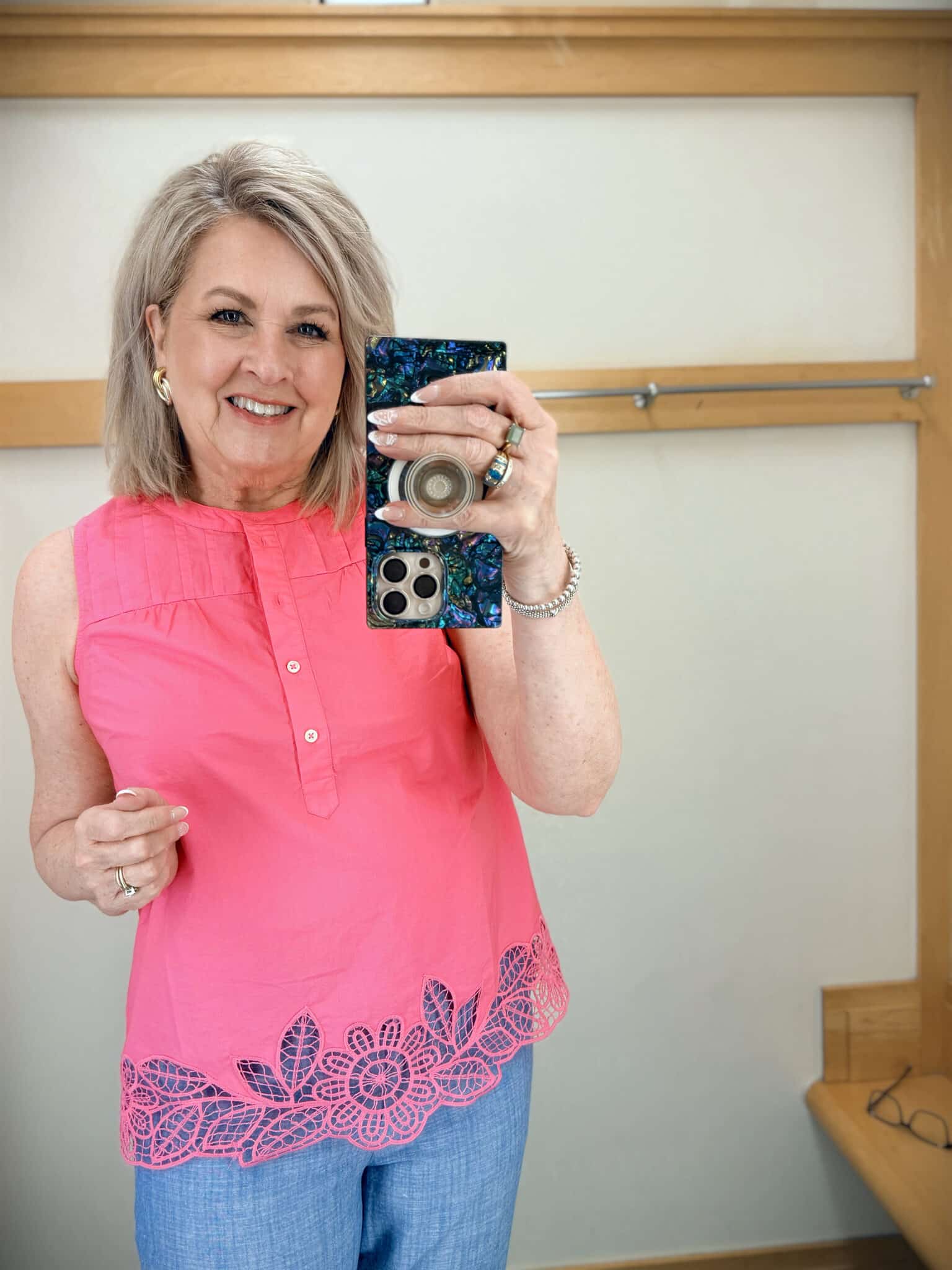 Tania wearing a pink top with lace details from Talbots