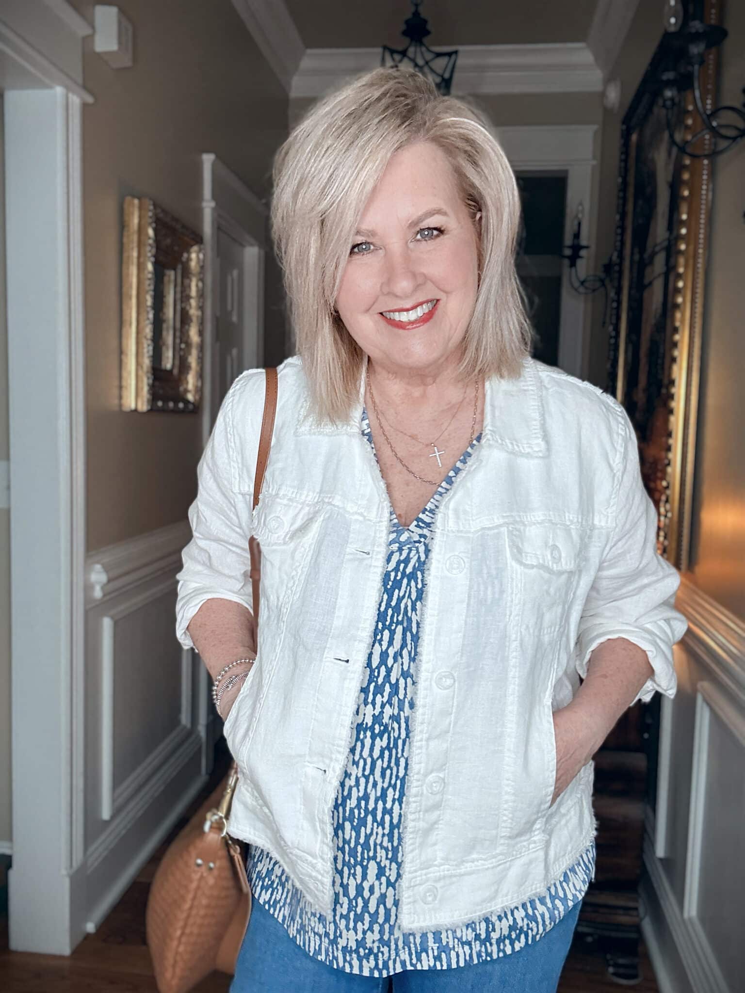 The raw-edge finish gives this linen jacket a relaxed look, while the lightweight fabric adds arm coverage without the weight of a traditional jacket.