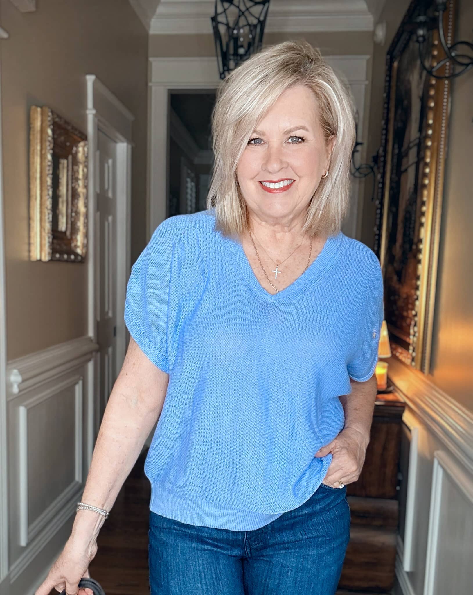 The open linen-blend knit gives this sweater texture and coverage without the thickness of a cold-weather sweater.