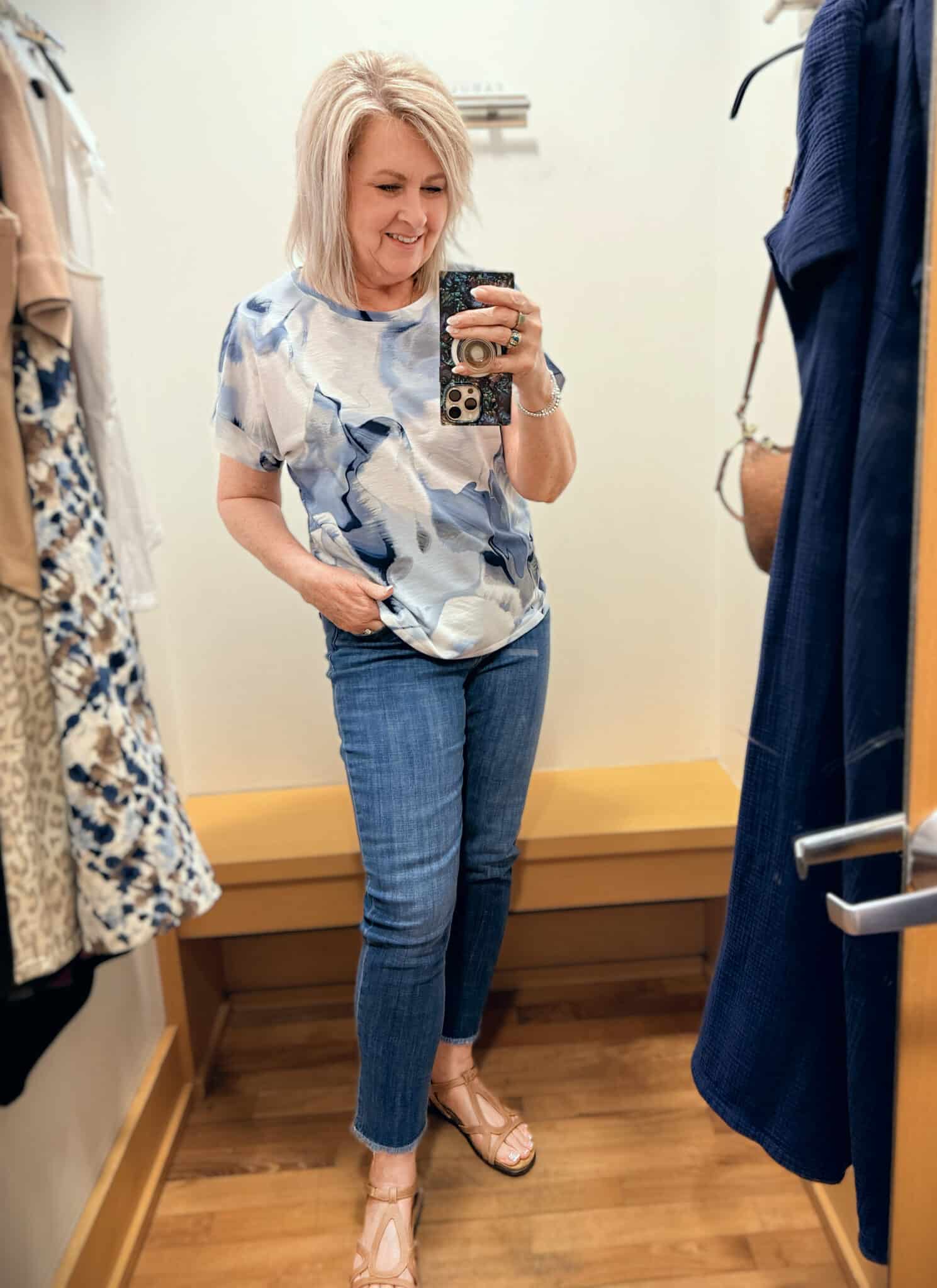 Tania wearing a watercolor tee with girlfriend jeans from Chico's