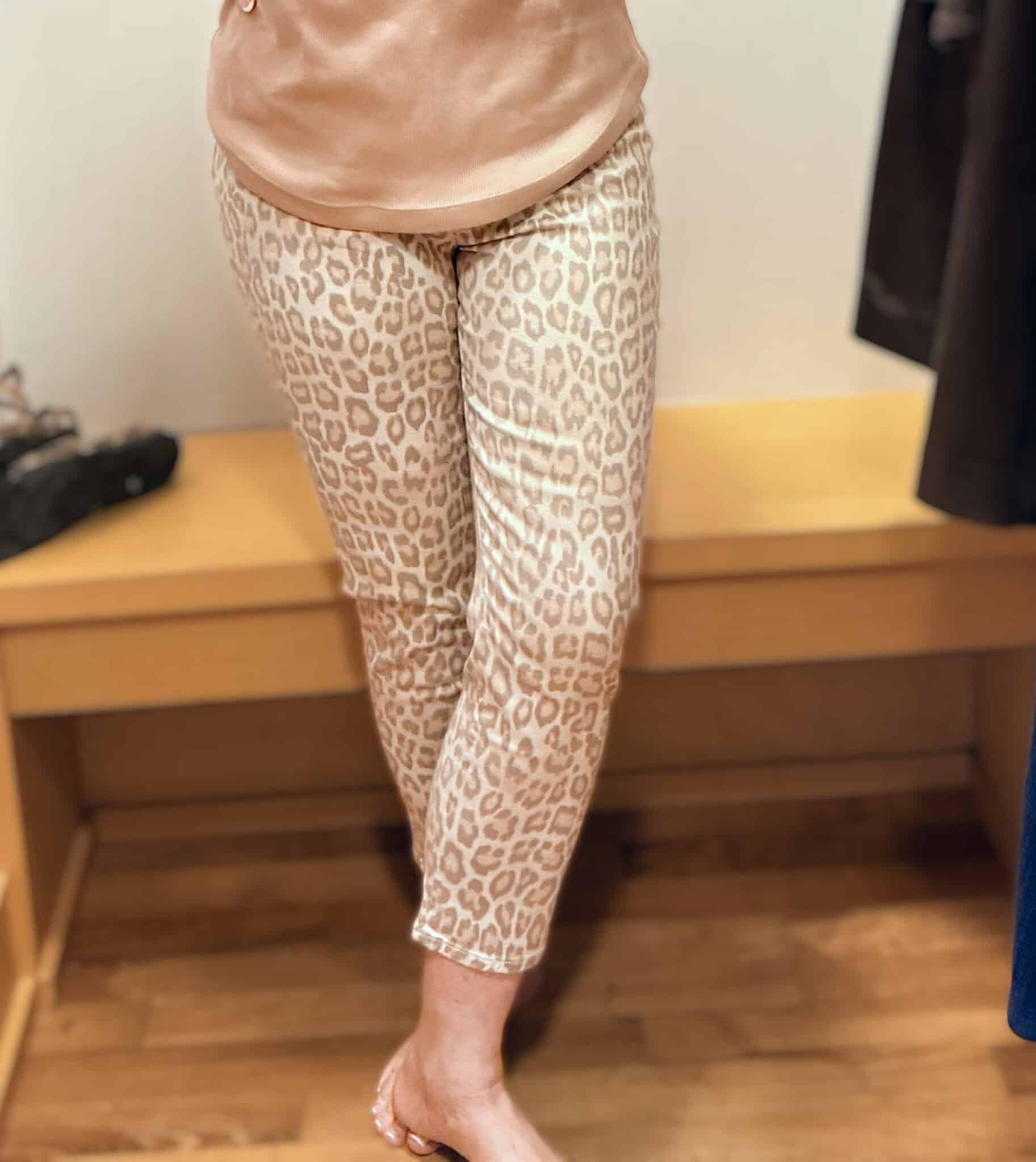 Tania wearing animal print pants from Chico's