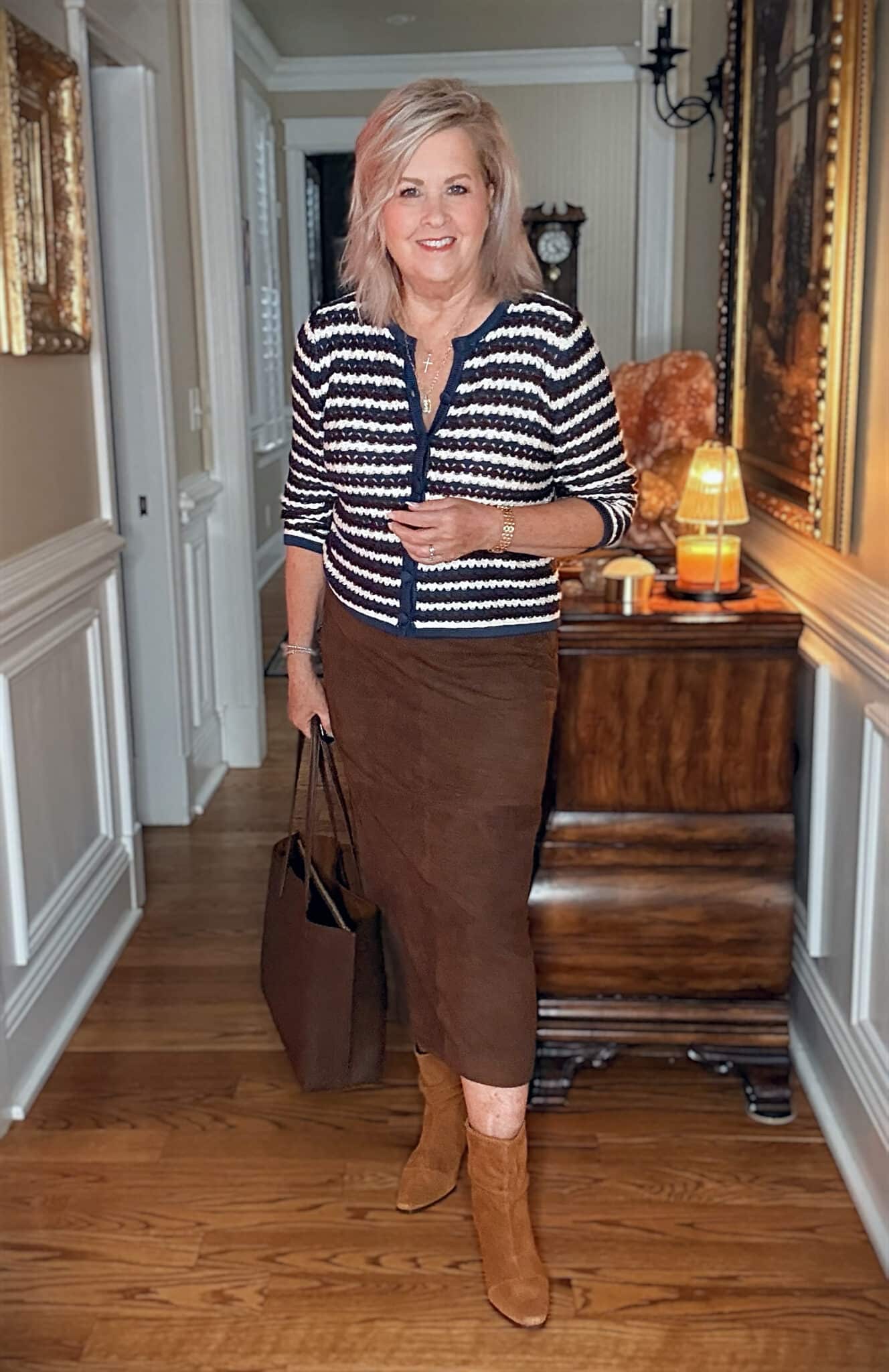 Tania wearing a brown suede midi skirt with Splendid scrunch boots from Nordstrom