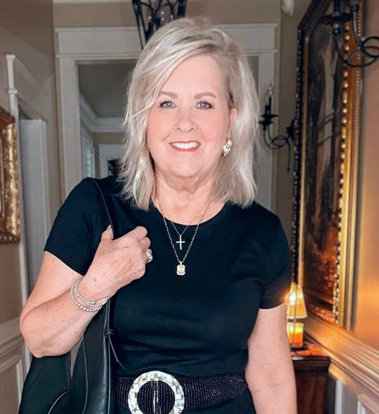 Tania wearing a black tee with knot earrings from Heaven Mayhem