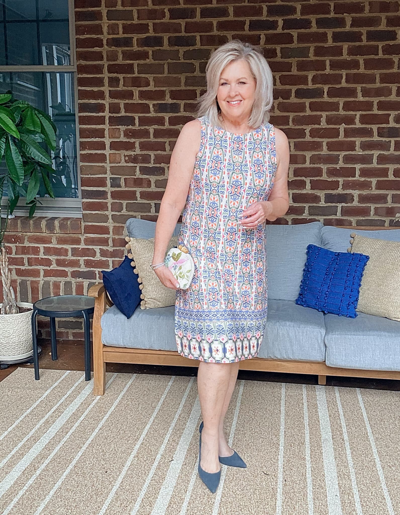 Tania wearing a mosaic sheath dress from Tommy Bahama