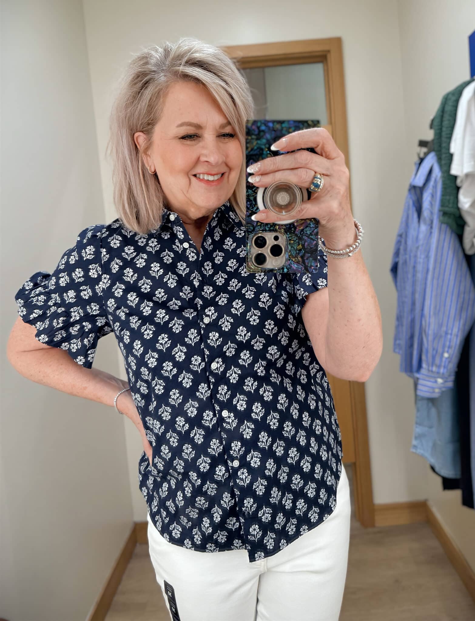 Tania wearing a floral navy & white button shirt from J.Crew Factory
