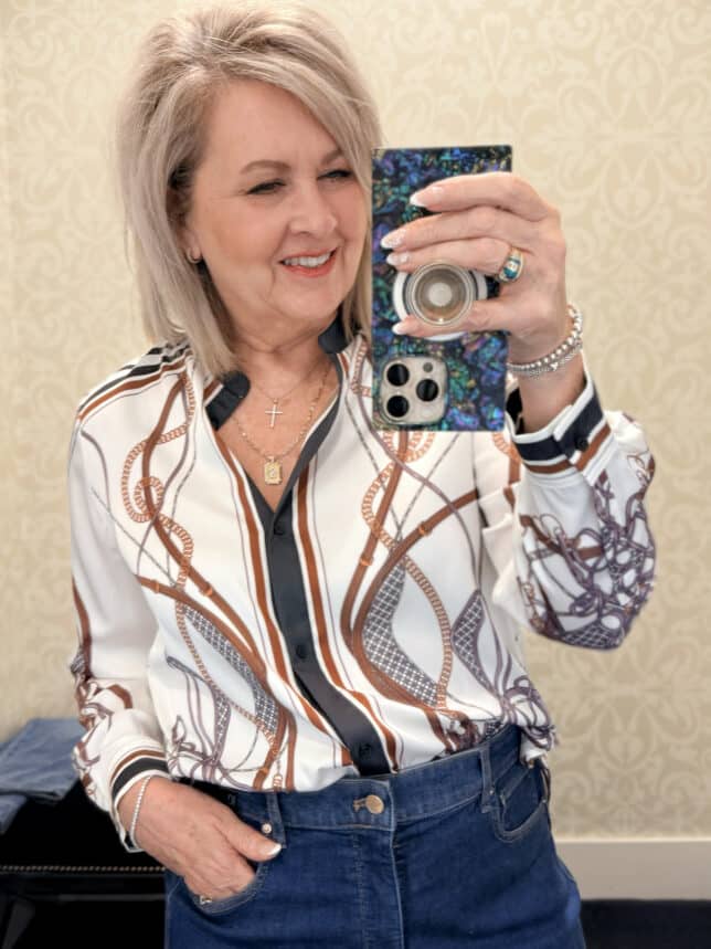 Tania wearing a satin printed blouse from White House Black Market