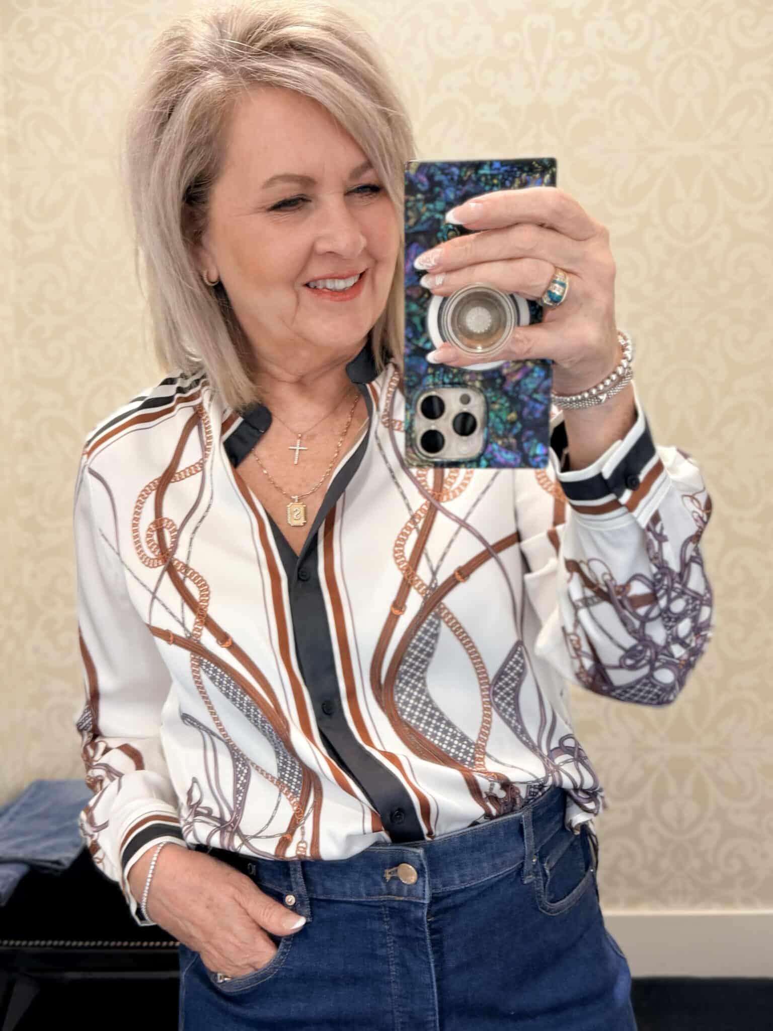 Tania wearing a satin printed blouse from White House Black Market