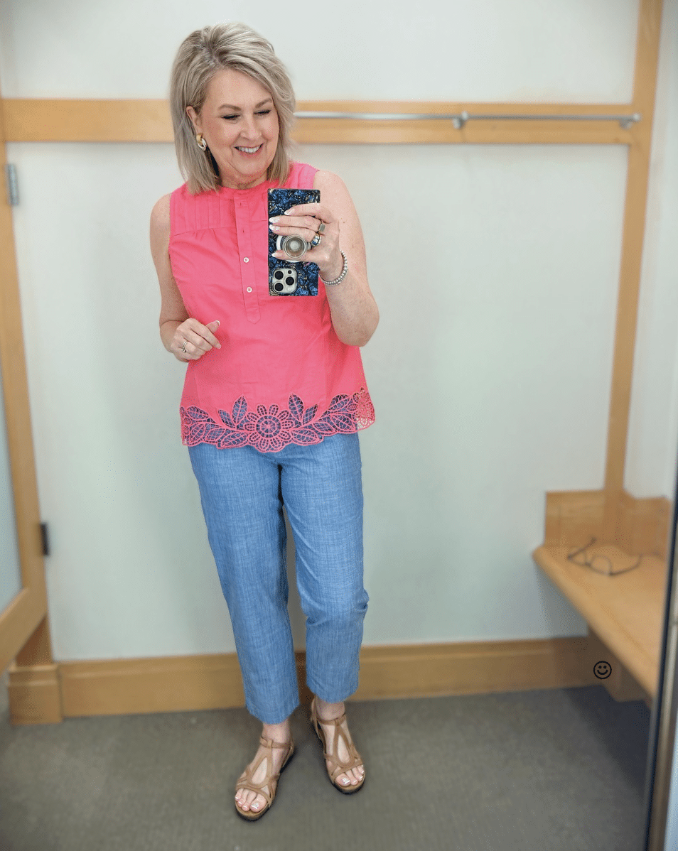 Tania wearing a pink top with lace details with chambray pants from Talbots