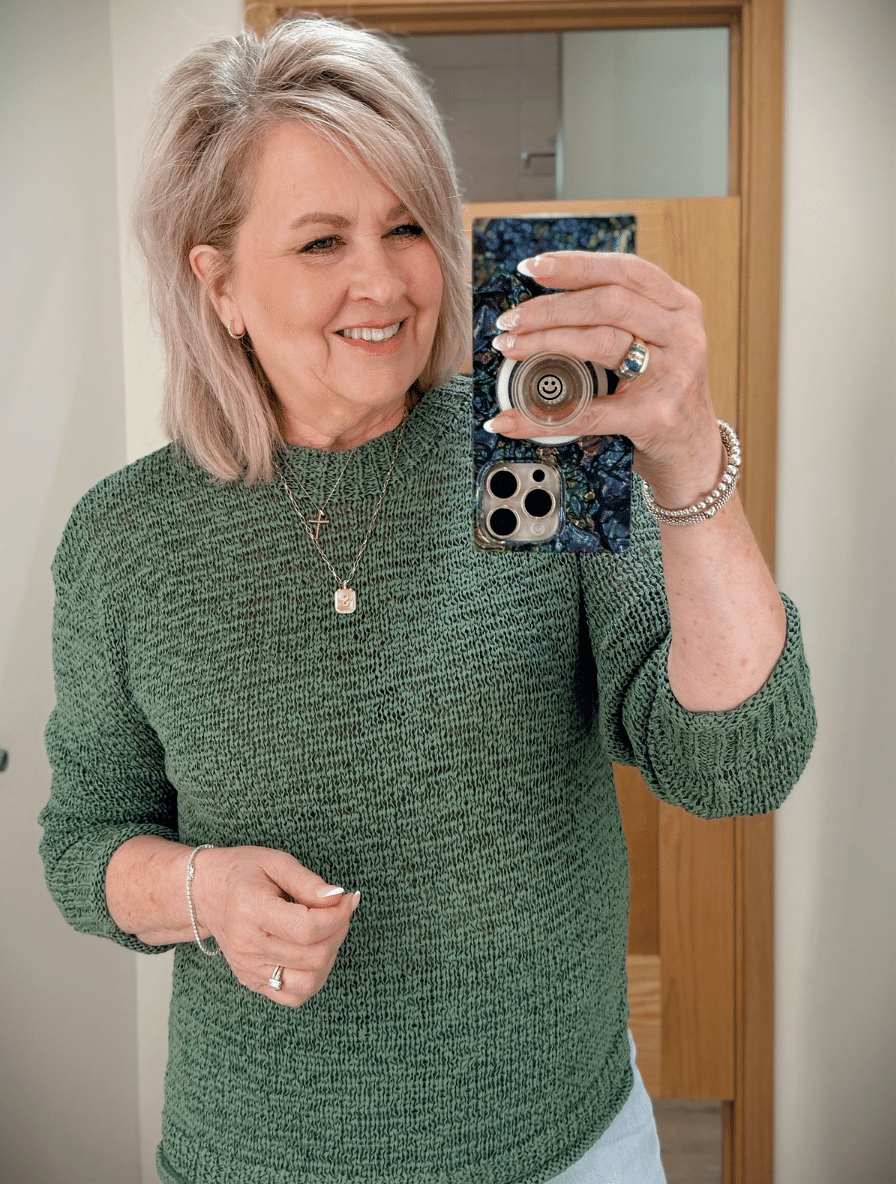 Tania wearing a green lightweight sweater from J.Crew Factory