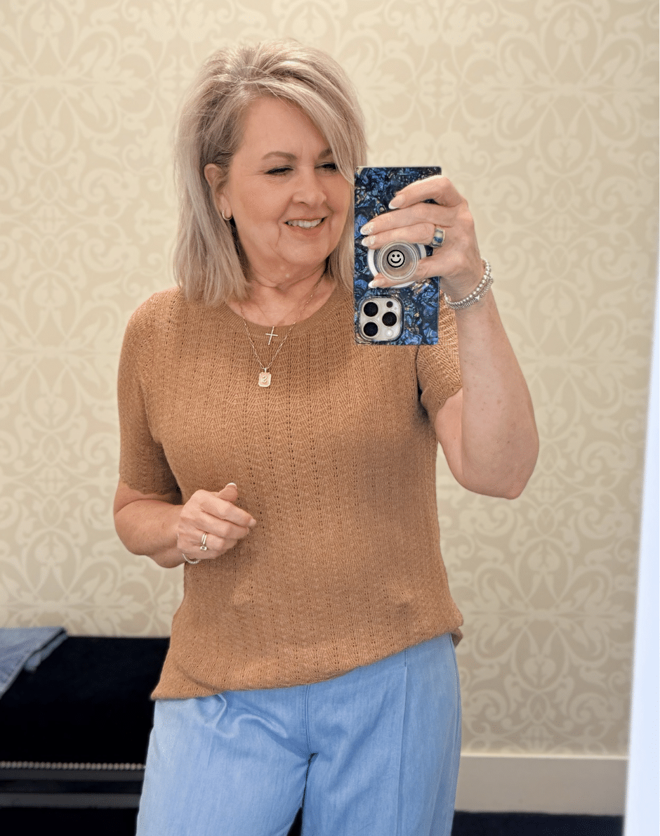 Tania wearing a camel ribbed top from White House Black Market