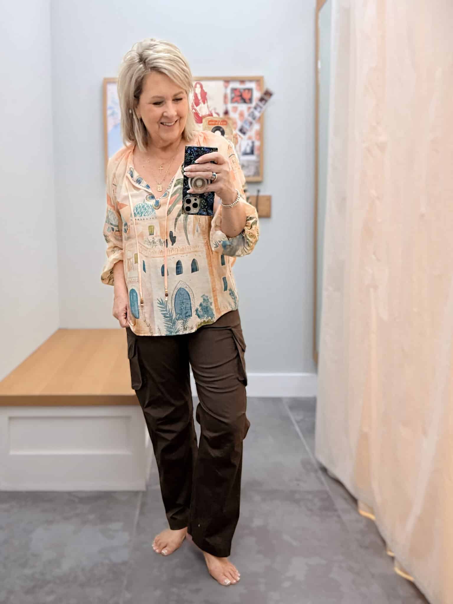 Tania wearing a Johnny Was lightweight printed top with chocolate brown cargo pants