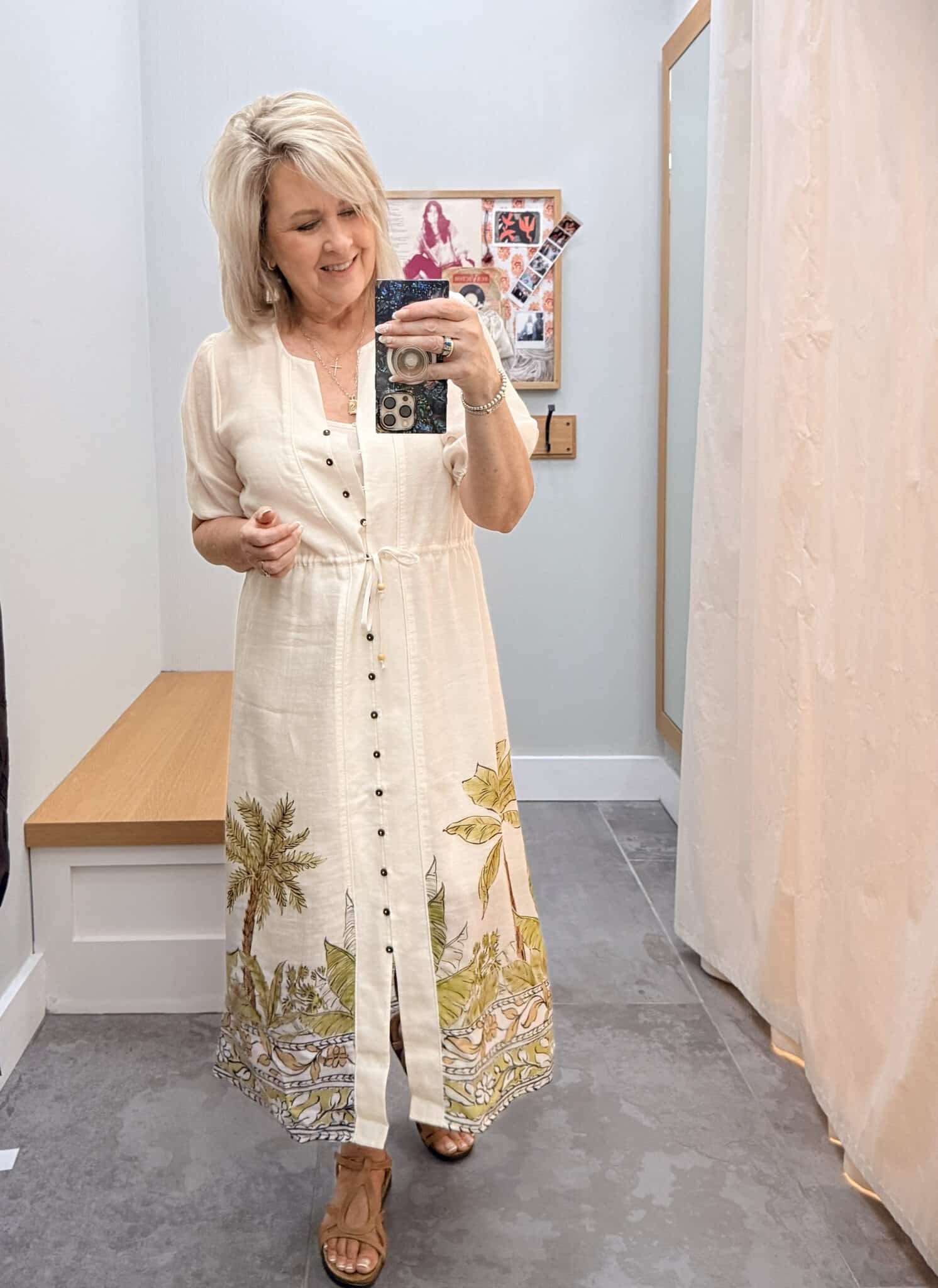 Tania wearing a Johnny Was Linen shirtdress with a palm tree print at the hem