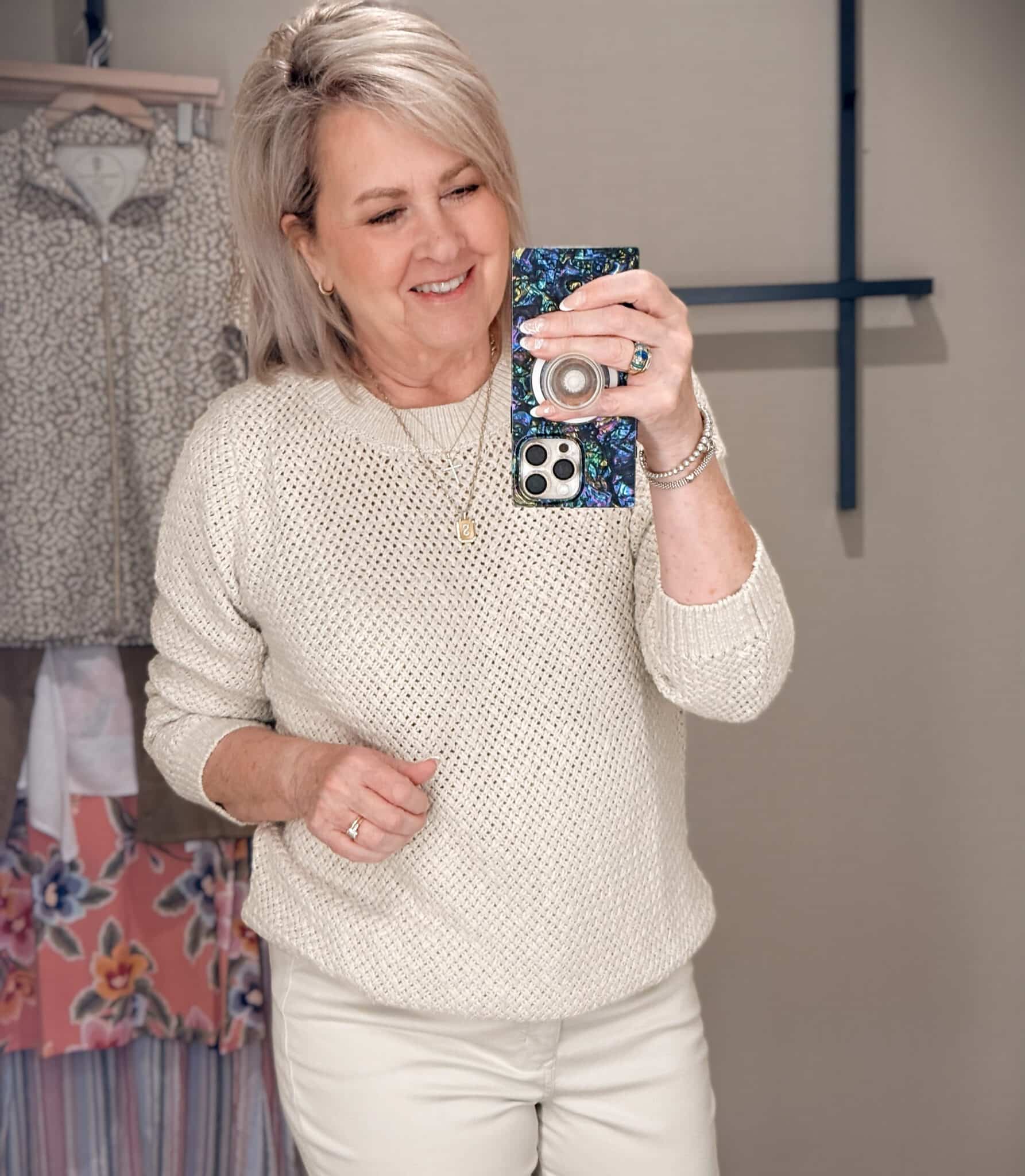 Tania wearing a neutral sweater from Tommy Bahama