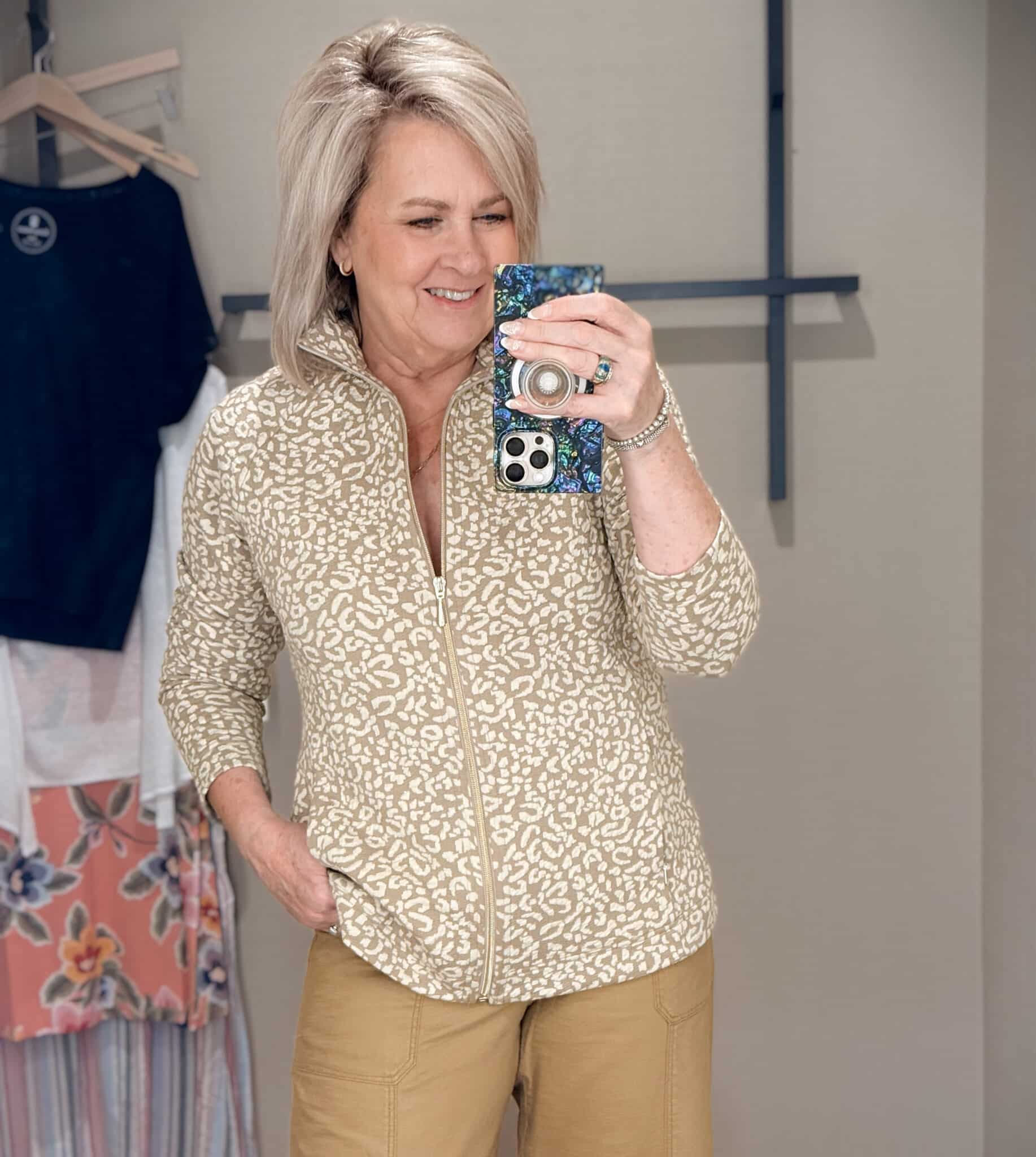 Tania wearing a leopard print sweatshirt from Tommy Bahama