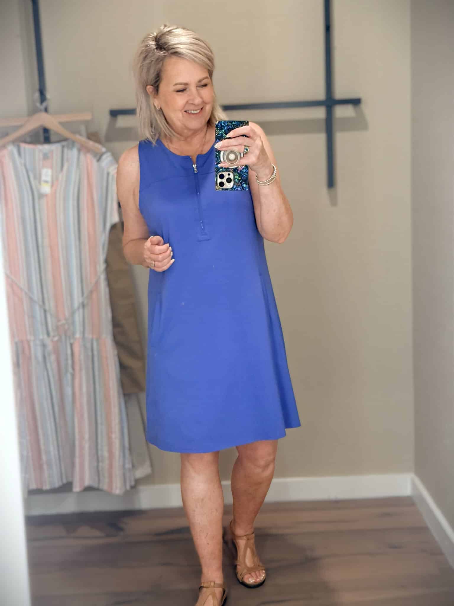 Tania wearing a blue 1/4 zip tank dress  from Tommy Bahama
