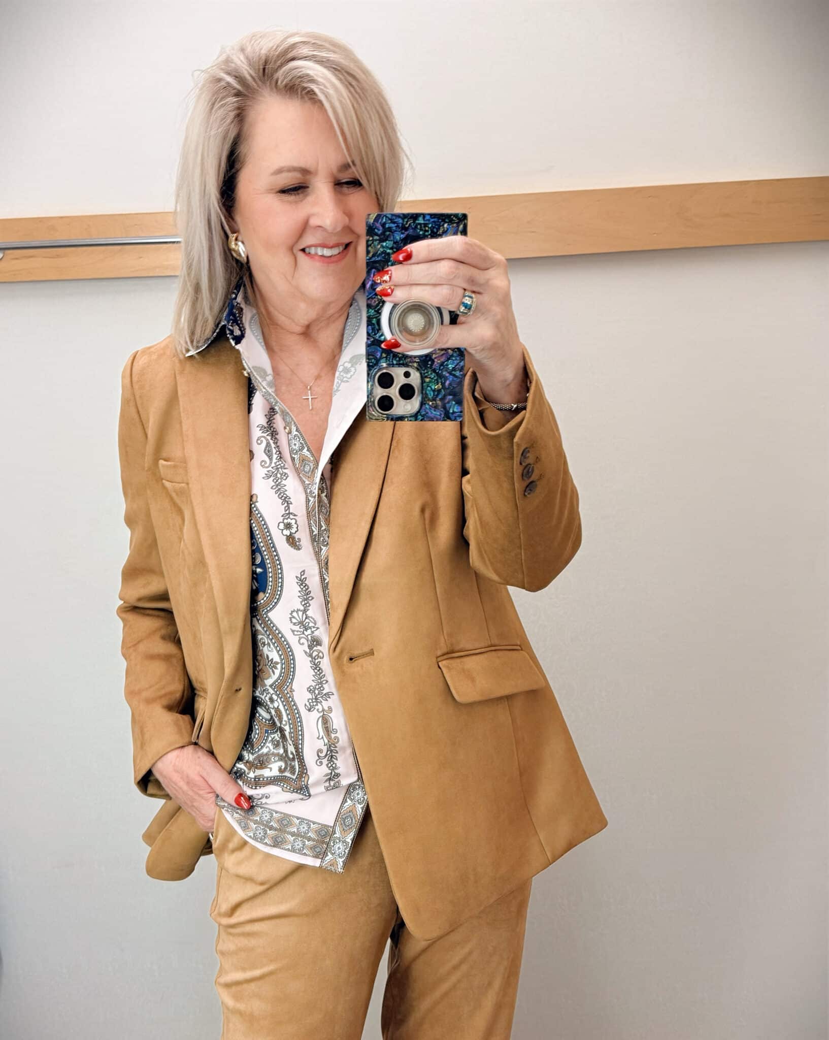Tania wearing a satin paisley button up shirt  and a faux suede blazer from Talbots