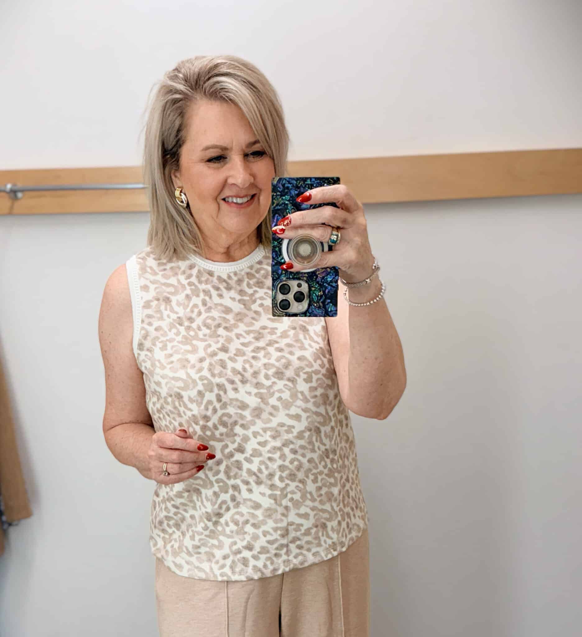Tania wearing a leopard print airknit shell from Talbots