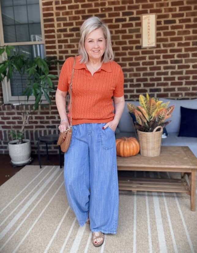 Tania, a woman over 50, is wearing lightweight pants for hot weather