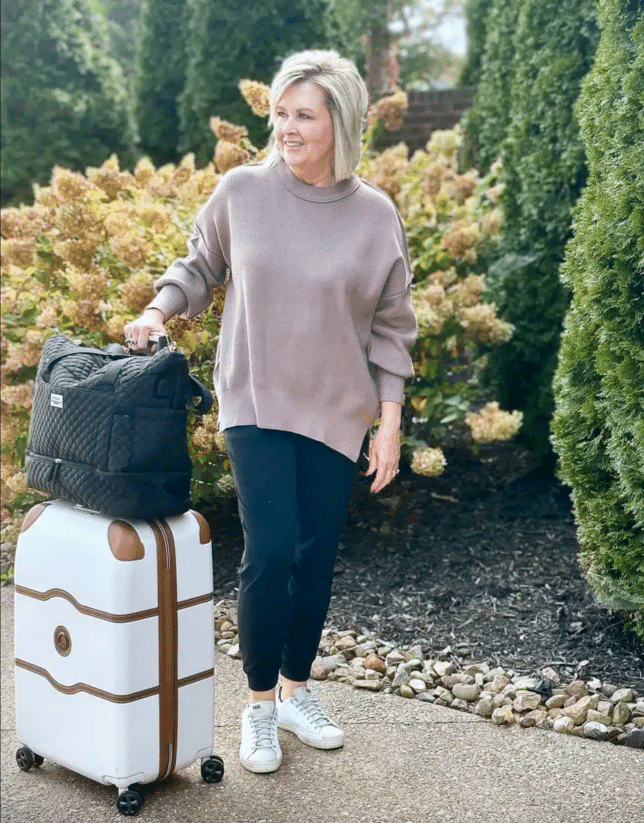 Tania wearing a sweatshirt and jogger travel pants